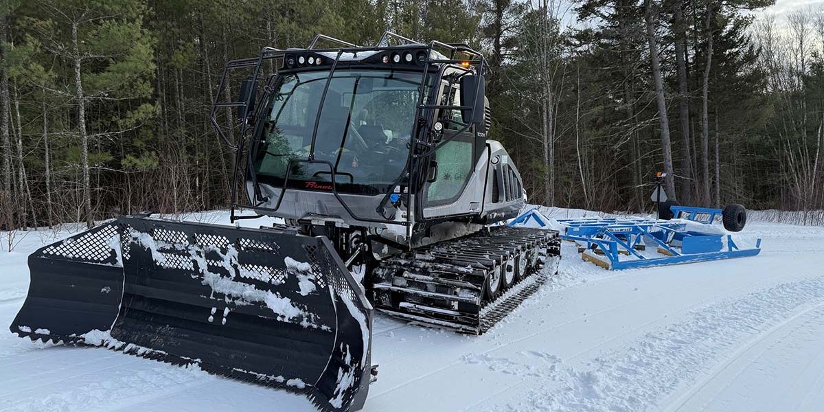 Brand new snow groomer for Central NH Snowmobile Club, enhancing trail maintenance for winter riders.